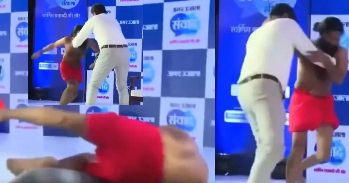 വേദിയിൽ അപ്രതീക്ഷിത ഗുസ്തി; ബാബ രാംദേവിനെ മറിച്ചിട്ട് മാധ്യമപ്രവർത്തകന്റെ കരുത്ത്
